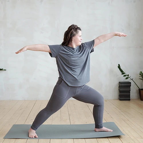 Girl with Down syndrome exercising  