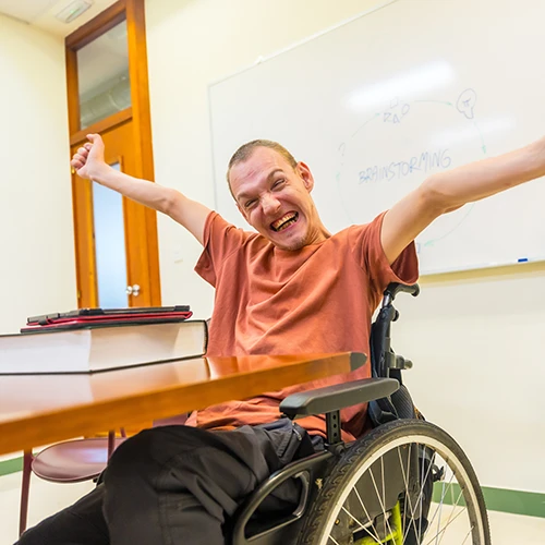 Man with disability proud of himself in the university 